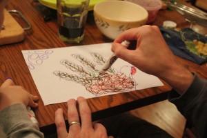 father making hand turkey